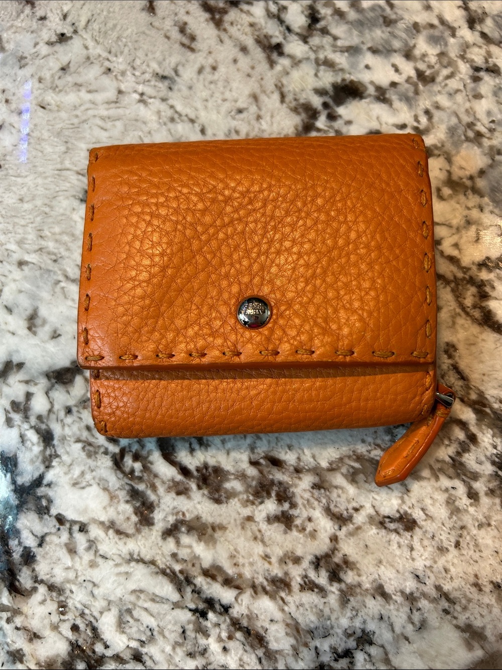 Fendi Orange Pebbled Leather Trifold Wallet